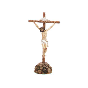 Crucifix for resting with a base in stones.